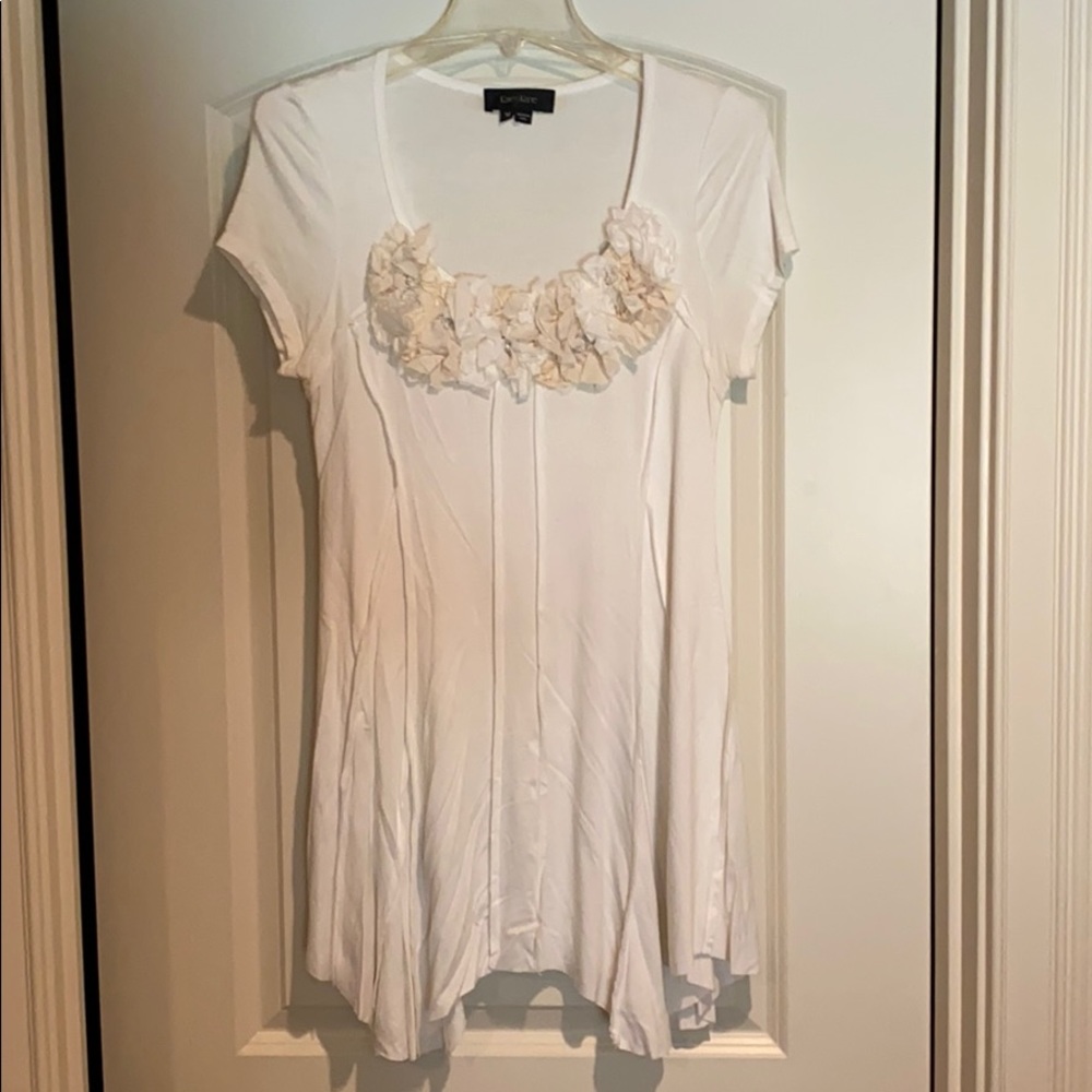 Karen Kane cream top with floral detail. Size M